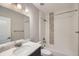 Modern bathroom with quartz countertops, decorative mosaic shower tiles, and tile flooring at 8661 Hunters Hill Ln, Littleton, CO 80125