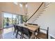Dining room area with access to outdoor porch and backyard at 8661 Hunters Hill Ln, Littleton, CO 80125