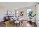 Bright home office with large windows providing natural light and backyard view at 8661 Hunters Hill Ln, Littleton, CO 80125