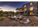 Backyard pond with rock features, lush landscaping, and beautiful water lilies at 8661 Hunters Hill Ln, Littleton, CO 80125