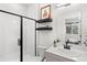 Modern bathroom with shower, toilet and floating vanity at 2115 Hummingbird Way # 201, Georgetown, CO 80444