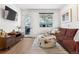 Living room with access to balcony and mountain view at 2115 Hummingbird Way # 201, Georgetown, CO 80444