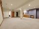 Spacious finished basement with a fireplace, wet bar, and ample room for recreation at 6321 S Harrison Ct, Centennial, CO 80121