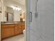 Bright bathroom with a glass-enclosed shower and a vanity at 6321 S Harrison Ct, Centennial, CO 80121