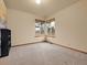 Empty bedroom offering natural light from two windows at 6321 S Harrison Ct, Centennial, CO 80121