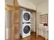 Convenient laundry area with stacked washer and dryer at 6321 S Harrison Ct, Centennial, CO 80121