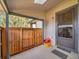 Covered patio space with a fenced enclosure for privacy at 6321 S Harrison Ct, Centennial, CO 80121