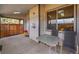 Cozy covered patio with outdoor seating, perfect for relaxing and entertaining at 6321 S Harrison Ct, Centennial, CO 80121