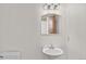 Simple bathroom with pedestal sink, toilet, and minimalist decor at 2020 Arapahoe St # 970, Denver, CO 80205