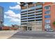 Modern building exterior featuring a unique facade and convenient street parking at 2020 Arapahoe St # 970, Denver, CO 80205