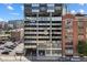 Modern building exterior featuring a unique facade and convenient street parking at 2020 Arapahoe St # 970, Denver, CO 80205