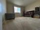 Bright bedroom with carpeted floor, window with blinds, and crib at 27869 E 7Th Pl, Aurora, CO 80018