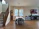 Dining area with table and chairs, wood floors at 27869 E 7Th Pl, Aurora, CO 80018