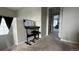 Upstairs hallway with piano and view to bedroom at 27869 E 7Th Pl, Aurora, CO 80018