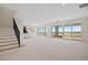 Spacious finished basement with large windows and walkout access at 6176 Oxford Peak Ln, Castle Rock, CO 80108