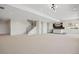 Finished basement with a staircase, bar area and expansive living space at 6176 Oxford Peak Ln, Castle Rock, CO 80108