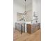 Stylish wet bar area with custom cabinetry, countertop, and sleek fixtures at 6176 Oxford Peak Ln, Castle Rock, CO 80108