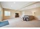 Large and inviting living room offering ample seating, great light, and perfect for gatherings and entertainment at 9744 W Ontario Pl, Littleton, CO 80128