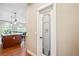 Walk-in pantry featuring an opaque glass door with unique decorative designs for added style at 9744 W Ontario Pl, Littleton, CO 80128