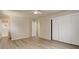 This bedroom features modern flooring, a ceiling fan, and a walk in closet at 633 S Galena St, Denver, CO 80247