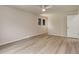 Light filled bedroom includes modern flooring, neutral walls, and contemporary ceiling fan at 633 S Galena St, Denver, CO 80247