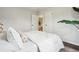 Bright bedroom featuring a large window and minimalist decor at 2459 S Corona St, Denver, CO 80210