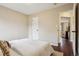 Bedroom showcasing hardwood floors, a closet, and an entryway at 2459 S Corona St, Denver, CO 80210