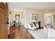 Inviting living room featuring hardwood floors, neutral tones, and stylish decor at 2459 S Corona St, Denver, CO 80210