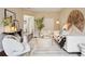 Bright living room showcasing modern decor, a plush rug, and abundant natural light at 2459 S Corona St, Denver, CO 80210