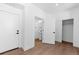 Bright bedroom with modern wood floors, fresh paint and featuring easy access to a private ensuite at 14241 Currant St, Broomfield, CO 80020