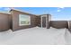 Exterior view of deck with a door and a window in winter with snow at 14241 Currant St, Broomfield, CO 80020