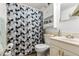 Neat bathroom with a patterned shower curtain at 8960 Judson St, Westminster, CO 80031