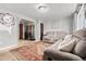 Cozy living room featuring neutral walls and an area rug at 8960 Judson St, Westminster, CO 80031