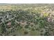 Aerial perspective of a rural community featuring picturesque landscapes, mature trees, and homes at 7390 Rafter Rd, Franktown, CO 80116