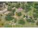 A picturesque aerial view of the entire property, highlighting the serene surroundings at 7390 Rafter Rd, Franktown, CO 80116