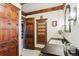 Unique bathroom featuring wooden cabinets, antique mirror, and historic charm at 7390 Rafter Rd, Franktown, CO 80116