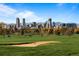 Scenic view of the City Park golf course with the Denver skyline in the distance at 2569 Forest St, Denver, CO 80207