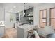 Stylish kitchen showcasing white quartz countertops and modern pendant lighting at 2569 Forest St, Denver, CO 80207