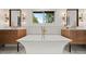 Close-up of the bright bathroom featuring a soaking tub and modern fixtures at 1490 S Vine St, Denver, CO 80210