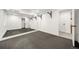 Bright home gym space with rubber flooring, full mirrors, and pull-up bar for workouts at 1490 S Vine St, Denver, CO 80210