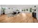 Bright, modern living area with sleek furniture, hardwood floors, and large windows offering scenic views at 1490 S Vine St, Denver, CO 80210