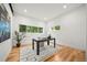 Bright office area with hardwood floors, large windows, and modern design at 1490 S Vine St, Denver, CO 80210