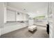 Large walk-in closet with custom shelving, drawers, ottoman and ample storage space at 1490 S Vine St, Denver, CO 80210