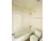 Compact bathroom featuring a tub-shower combo and toilet, perfect for maximizing space and functionality at 10475 Applebrook Cir, Highlands Ranch, CO 80130
