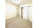 Bright bedroom with carpeted floor and ample closet space, offering comfort and convenient storage at 10475 Applebrook Cir, Highlands Ranch, CO 80130