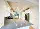 Modern kitchen featuring granite countertops and stainless steel appliances at 10475 Applebrook Cir, Highlands Ranch, CO 80130