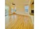 Open concept living space featuring hardwood floors and sliding glass door at 10475 Applebrook Cir, Highlands Ranch, CO 80130