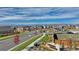 An aerial view of the new community featuring a view of the mountains, sidewalks, and green spaces at 4316 Gypsum Ave, Mead, CO 80504
