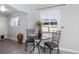 Cozy dining area with natural light and modern furnishings at 1376 S Zephyr Ct, Lakewood, CO 80232