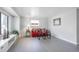 Cozy living room with sleek floors, modern decor, and natural light at 1376 S Zephyr Ct, Lakewood, CO 80232